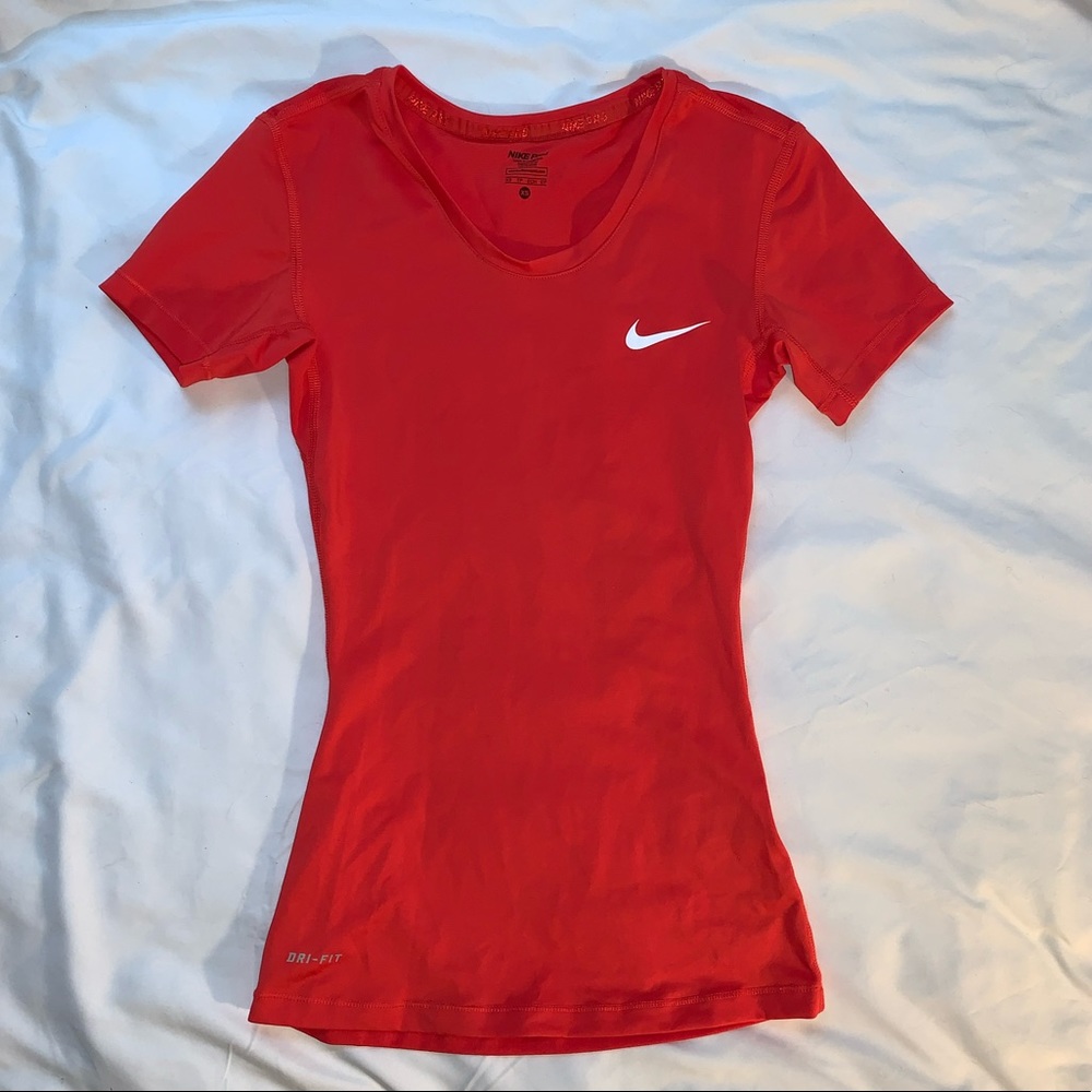 red nike dri-fit shirt
